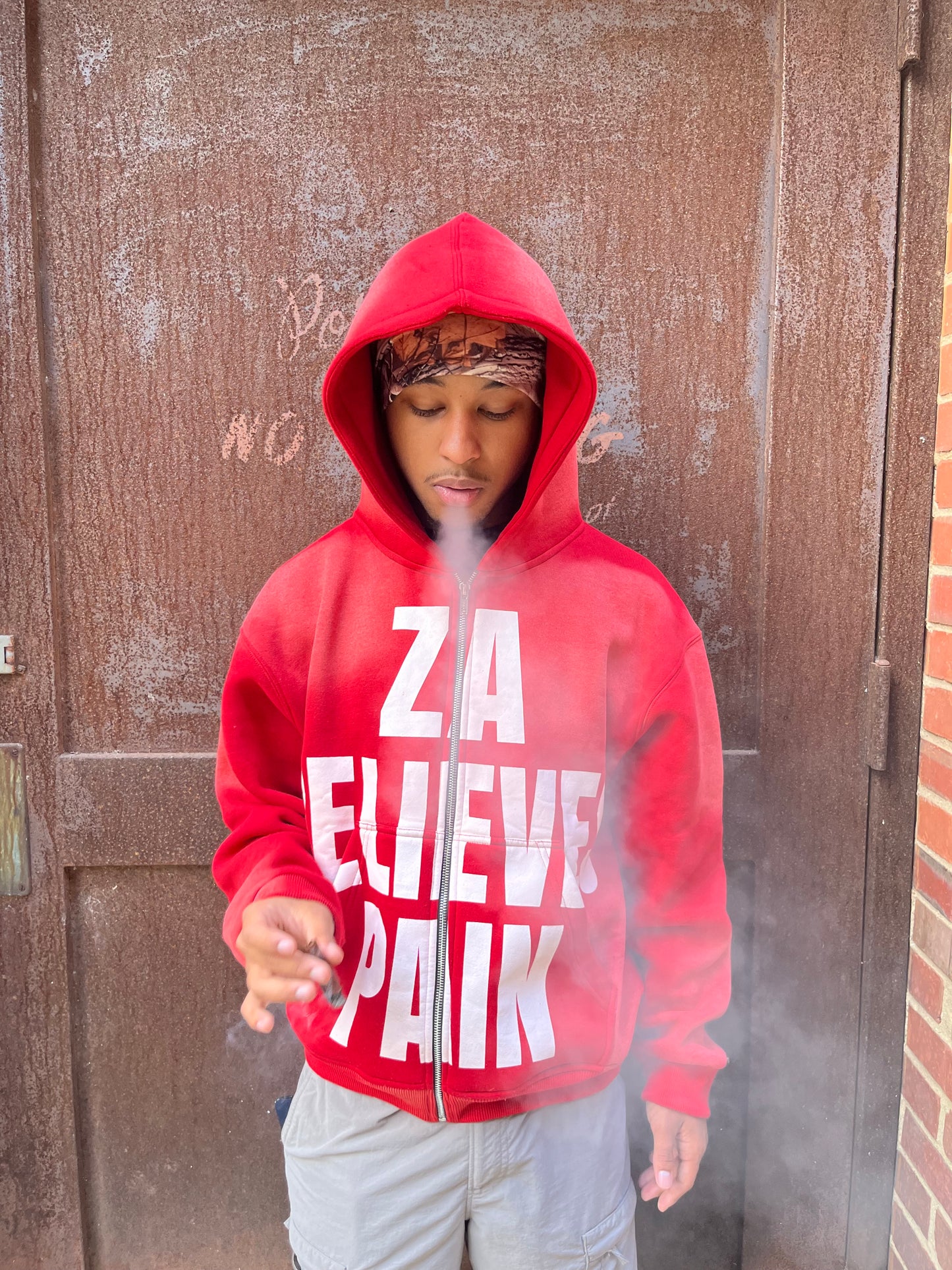 “Za Relieves Pain” zip up