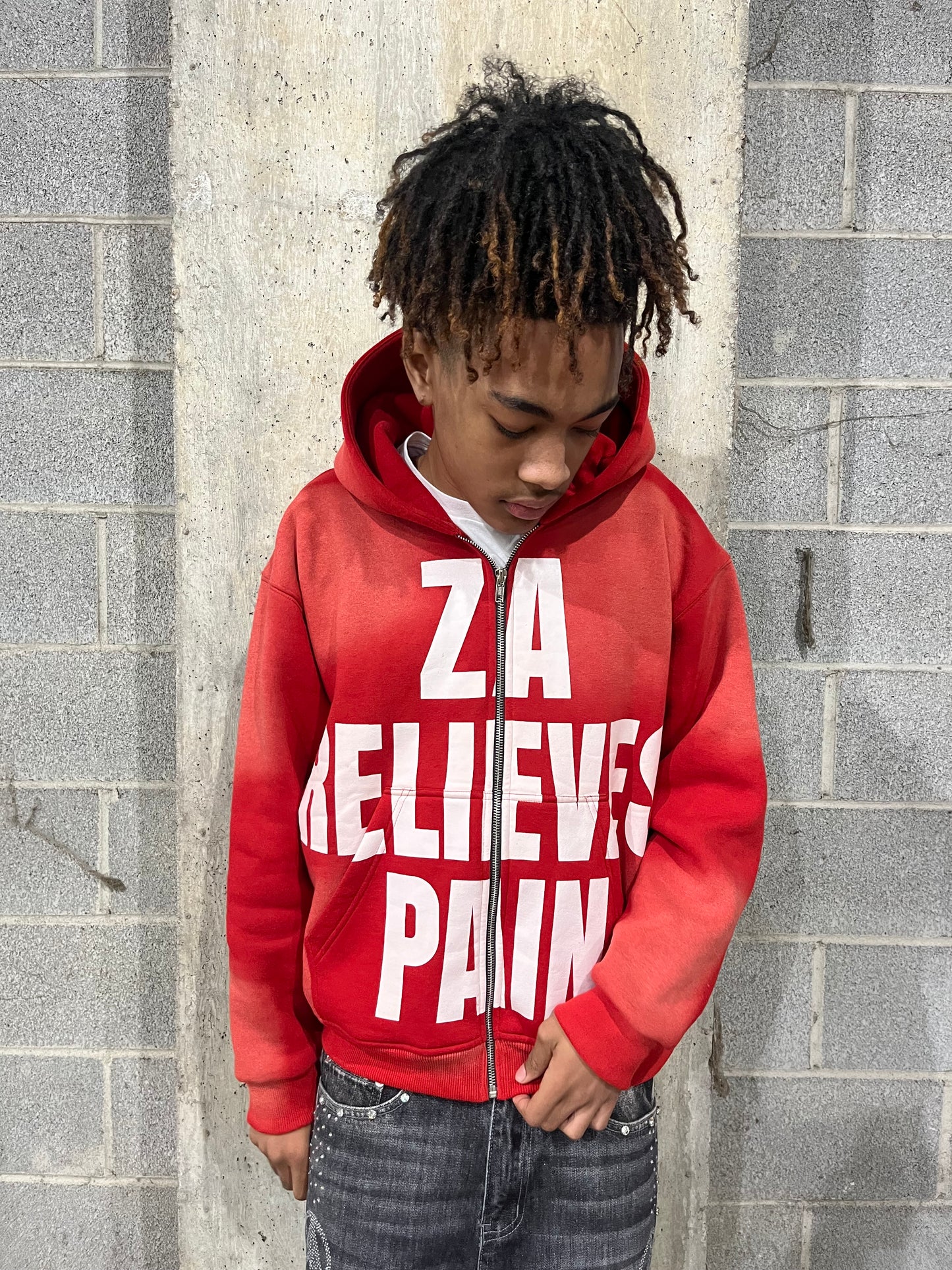 “Za Relieves Pain” zip up